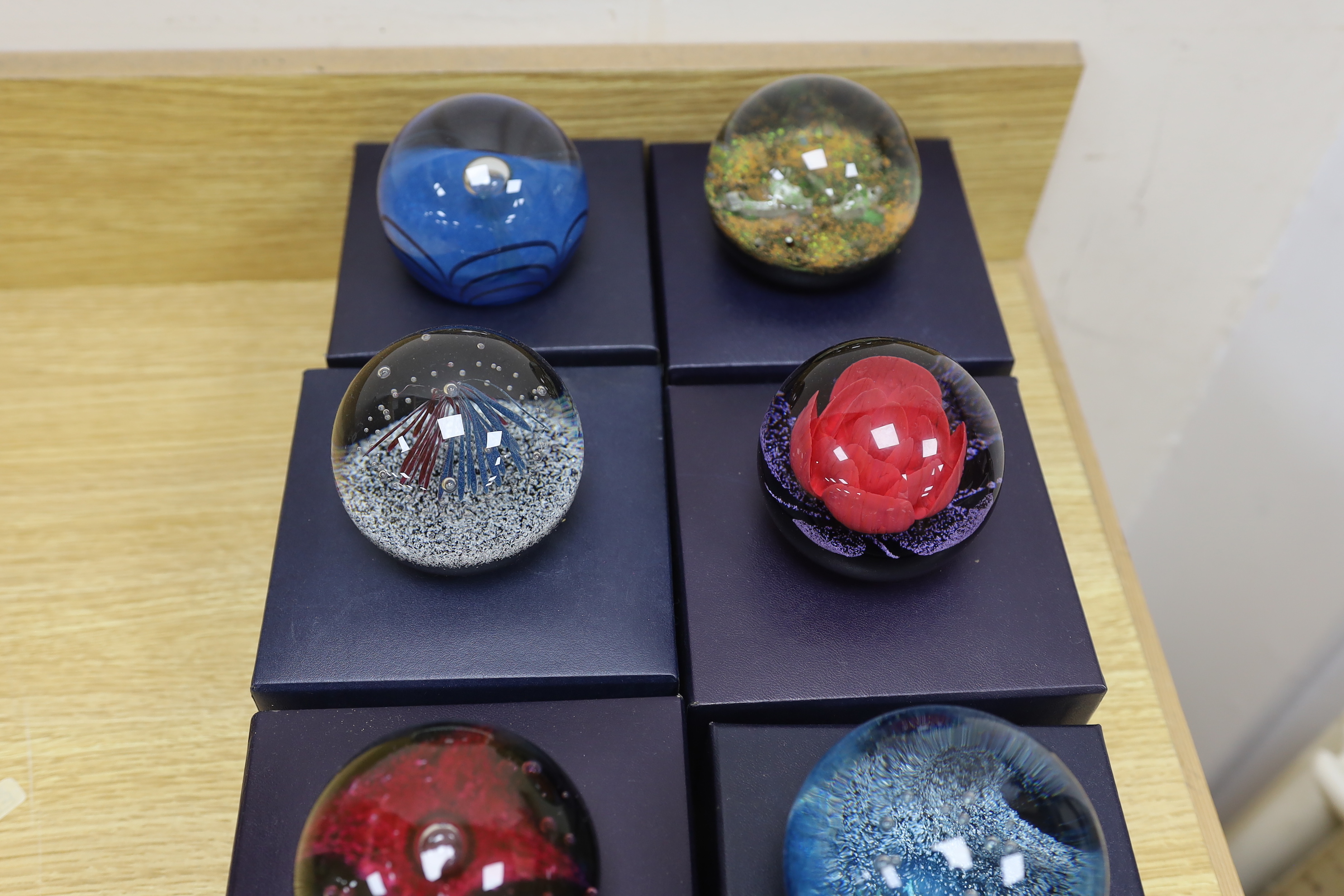 Nine Caithness paperweights, boxed, some limited edition